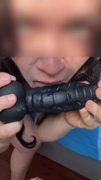 Wet brunette gets her dildo deep inside her pussy