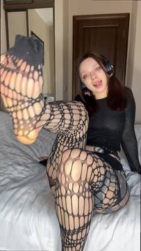 She spreads her legs wide on the bed 💦