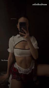 Sensual schoolgirl striptease and party show