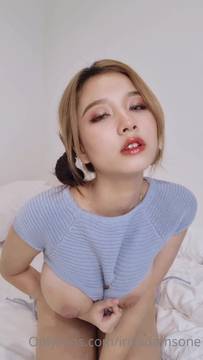 Curvy busty Asian showing her tits