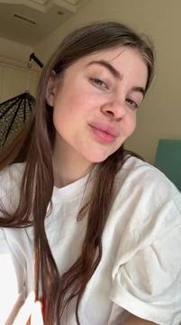 Cute brunette chilling in her white tee
