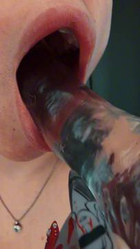 Deep throating a clear glass dildo. Tap in OnlyFans for more