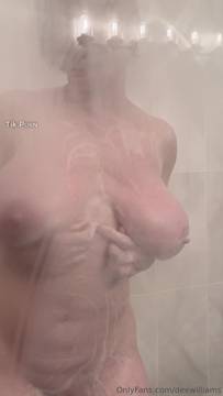 Horny mom caught in the shower with toys in all her holes