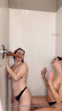 Me and my hot teen girlfriend sucking on a dildo in the shower