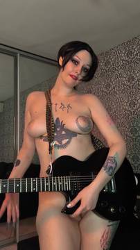 I shouldn't be posing like this with my guitar.