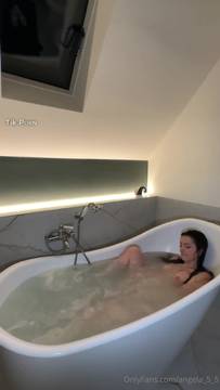 Masturbating under water in the bathtub