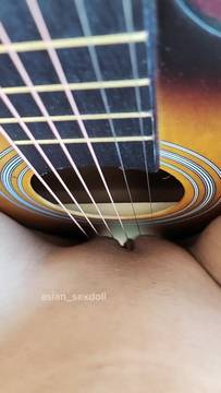 Naked Thai Girl Falls on a Guitar