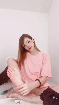 Cute girl making a show, bending over and teasing her pussy